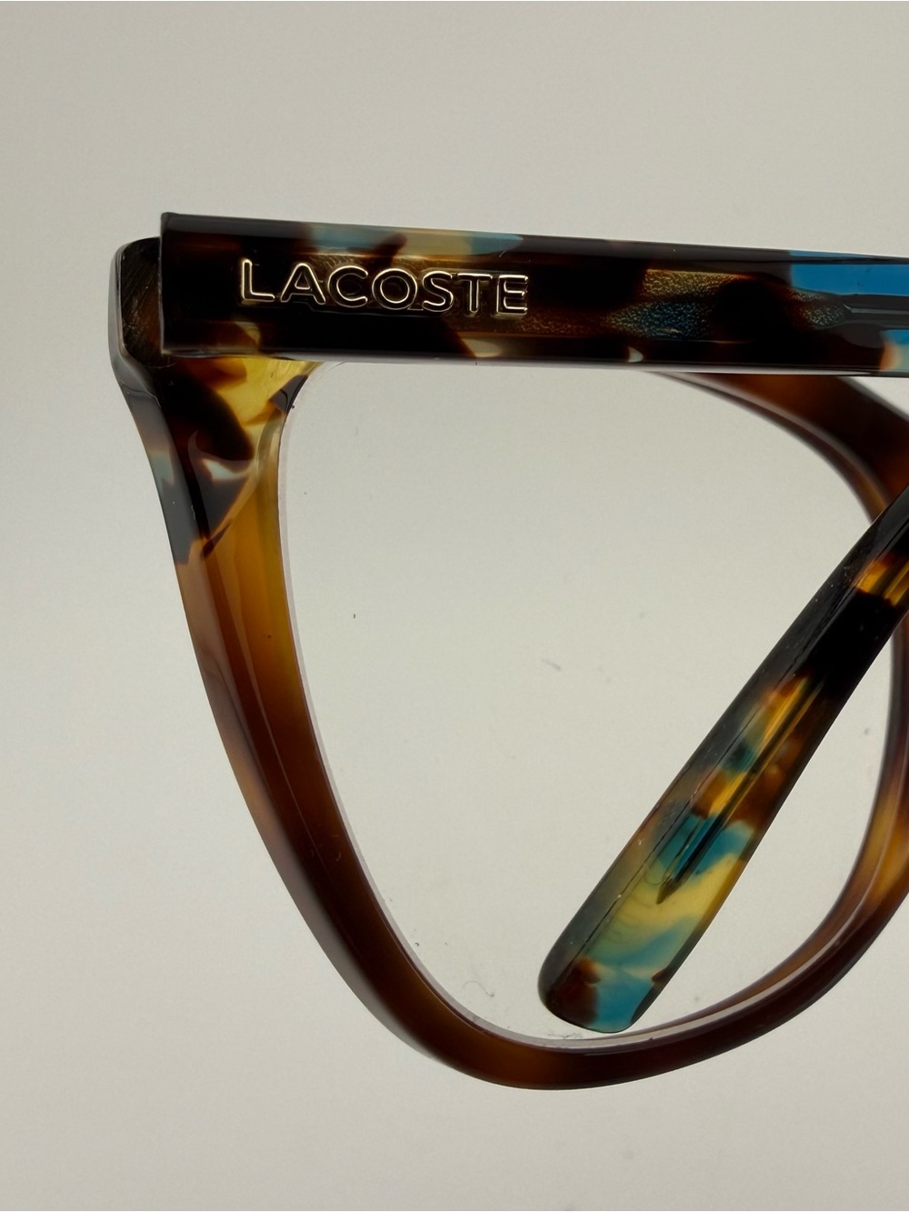 Lacoste Women's Tortoise Round Frame Glasses with Green-Blue Marble Temples